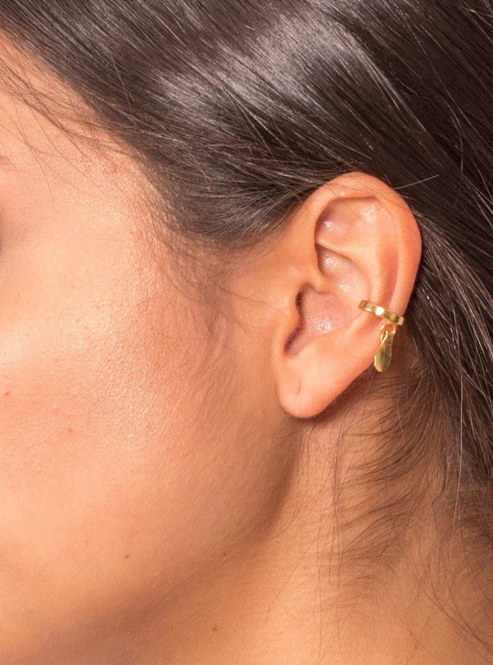 Arete Ear Cuff Sencillo Semilla Sagrada - Pilú Joyería. Joyas y accesorios con diseños exclusivos