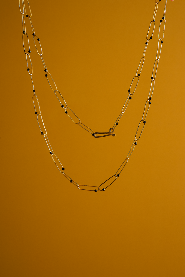 COLLAR ESLABONES ONIX DORADO