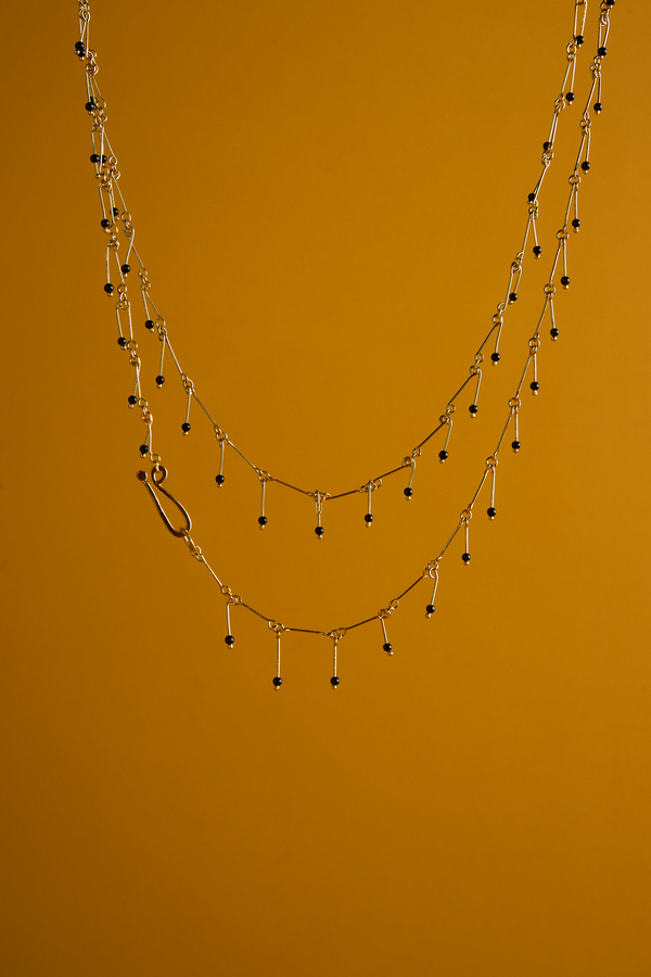 COLLAR PERDIGON ONIX DORADO