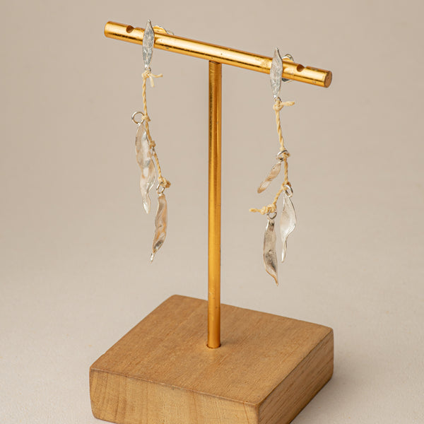 ARETES LARGOS HOJITAS CÚRCUMA CUMARE PLATA LEY 950
