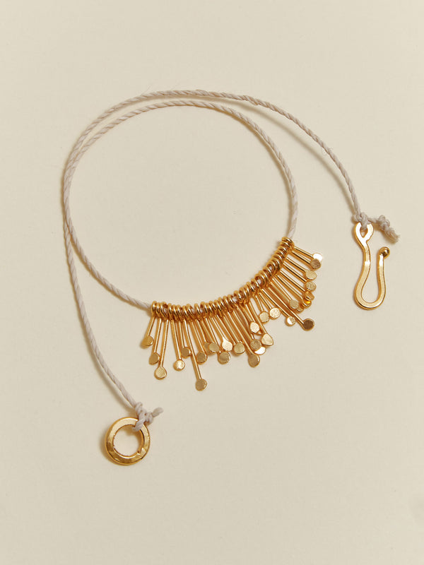 Collar perdigones dorados grande cumare