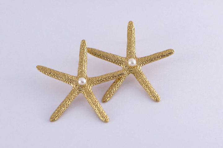 Aretes Estrella De Mar Perla - Pilú Joyería. Joyas y accesorios con diseños exclusivos