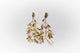 Aretes maxi hojas Chiribiquete dorado - Pilú Joyería. Joyas y accesorios con diseños exclusivos