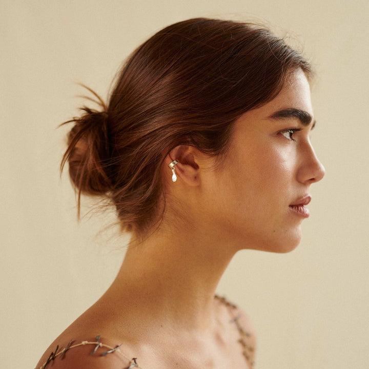 Arete Ear Cuff Sencillo Semillas Sagradas Baño Plata - Pilú Joyería. Joyas y accesorios con diseños exclusivos