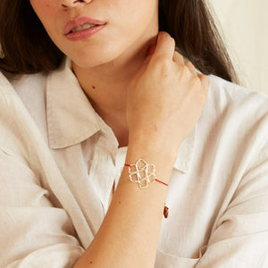 Pulsera atarraya hilo rojo baño plata