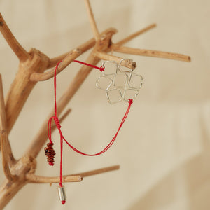 Pulsera atarraya hilo rojo baño plata
