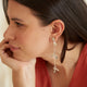 Aretes Largos Semilla Sagrada Baño Plata