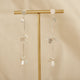 Aretes Largos Semilla Sagrada Baño Plata