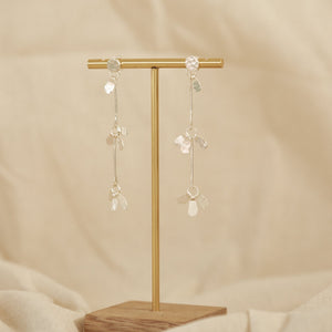 Aretes Largos Semilla Sagrada Baño Plata