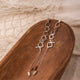 Aretes Peces Plateado - Plomo Hilo Beige